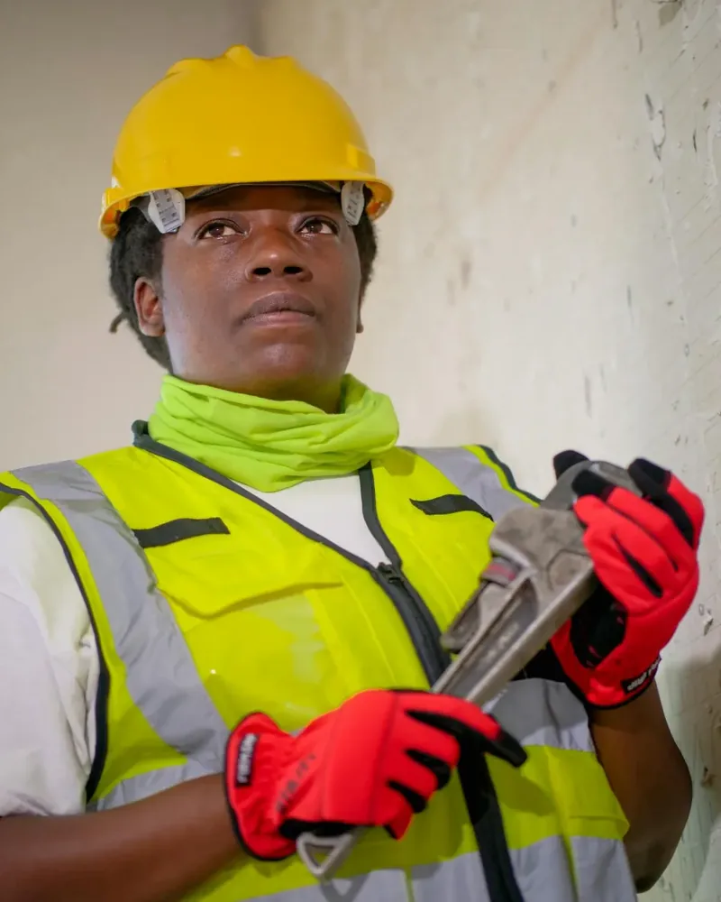 Hartwell & Sons technician with tools ready for a residential service call
